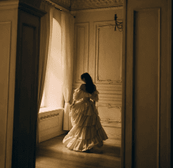 Woman standing in a doorway